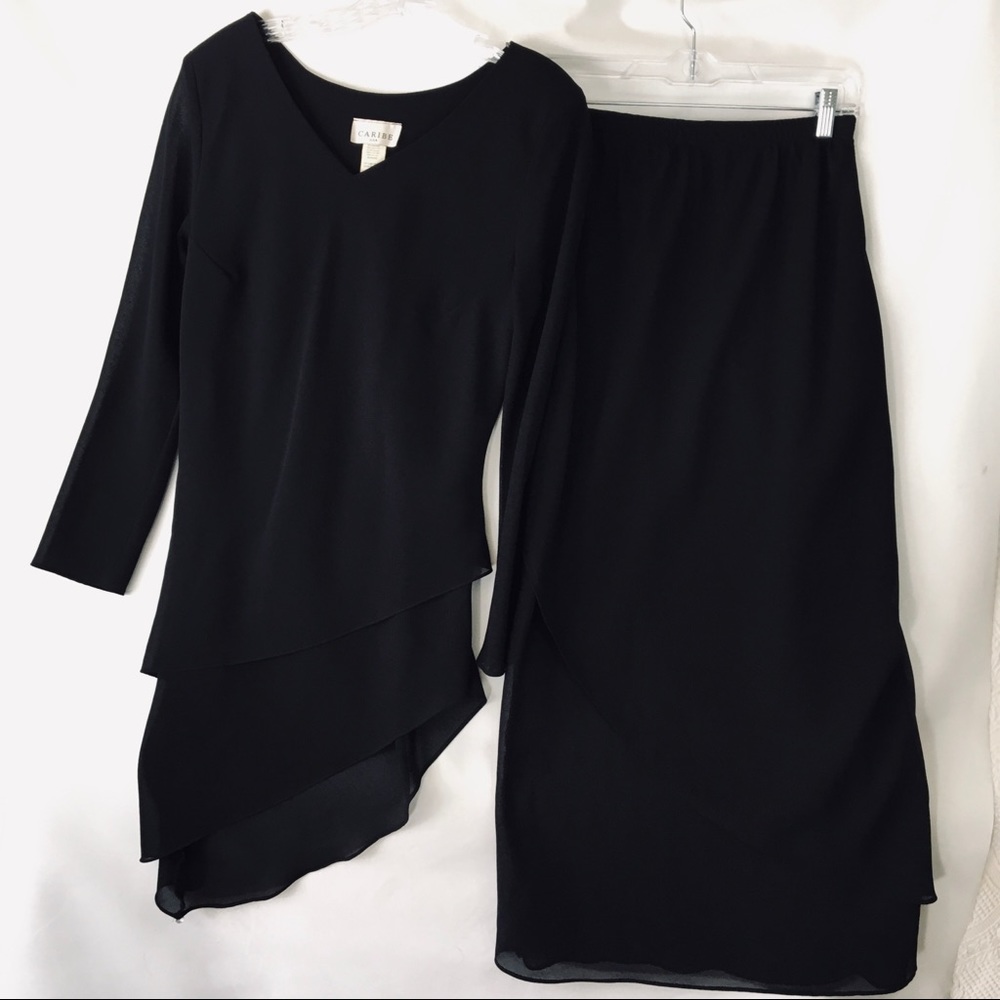 Woman’s small two piece black evening dress